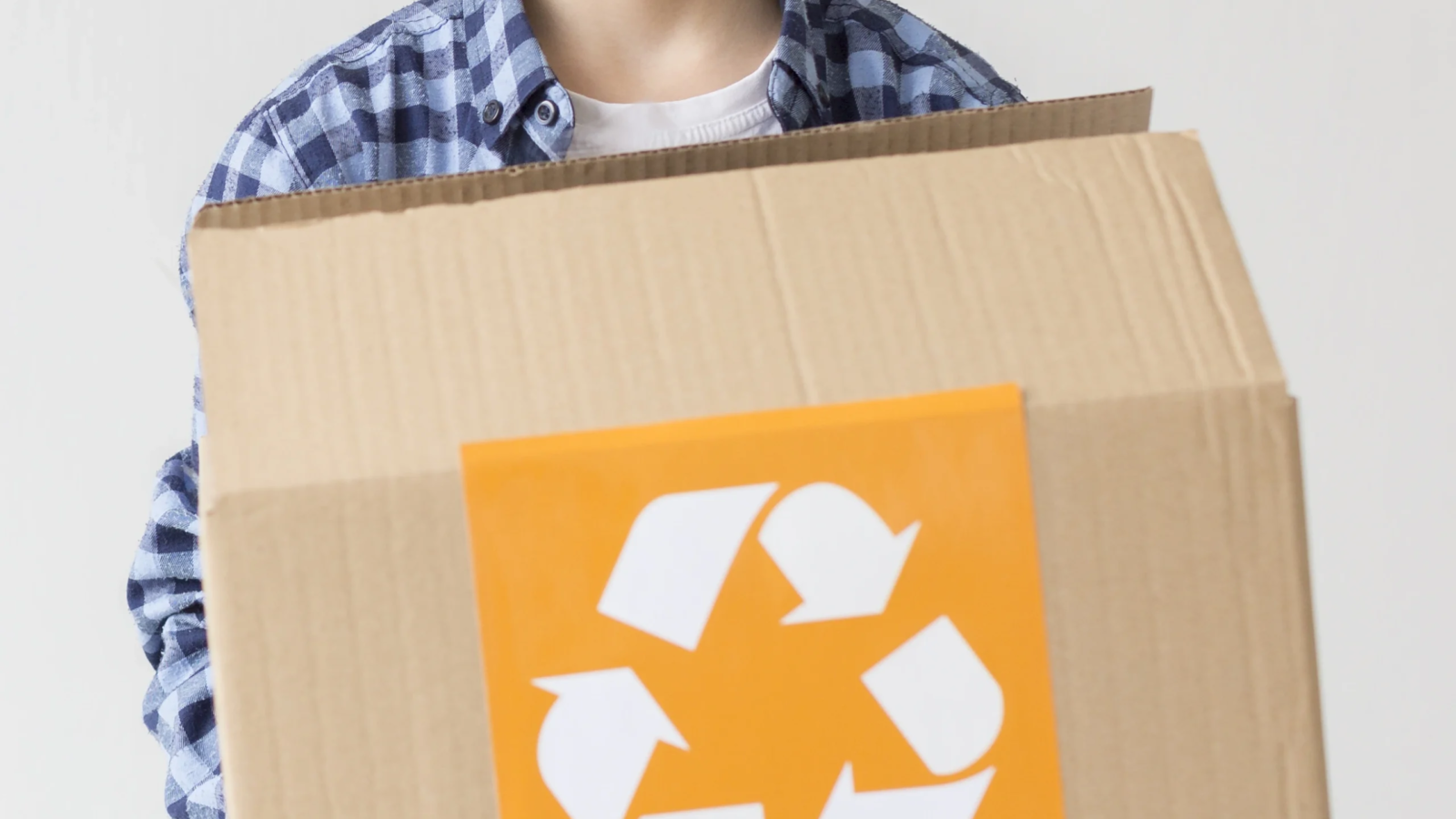 portrait-cute-young-boy-holding-recycling-box